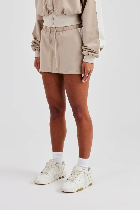 Panelled Nylon Mini Skirt - Stone flowy skirt hem